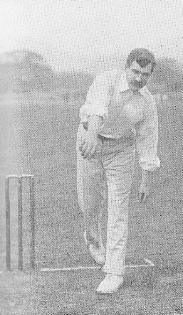 Ein Mann in einem weißen Cricket-Outfit spielt Cricket mit Wickets auf dem Boden, Bäumen und Himmel im Hintergrund; Text unten lautet "Cricket-Spieler des Jahres."