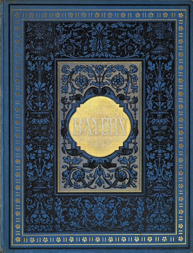 Ein blau-goldenes Buch mit dem Titel "Bayern" und kunstvollen Verzierungen auf dem Cover.