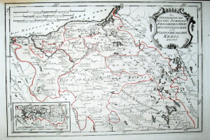 Alte Deutschlandkarte mit einer roten Linie darauf, auf Papier gedruckt mit Text.