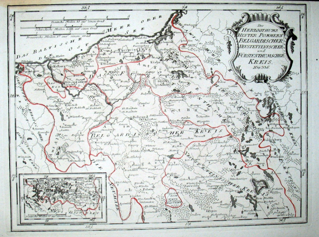 Alte Deutschlandkarte mit einer roten Linie darauf, auf Papier gedruckt mit Text.